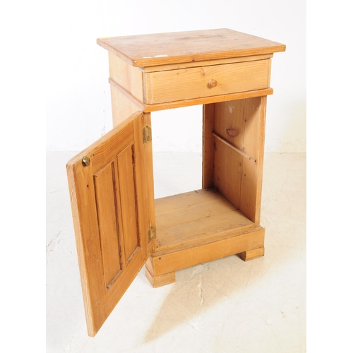 940 - A 20th century Victorian style pine wood bedside table pot cupboard. The bedside raised on block fee... 