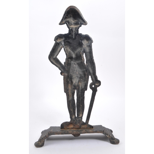 941 - An early 20th century cast iron figurative doorstop. The doorstop in the form of an 18th century Bri... 