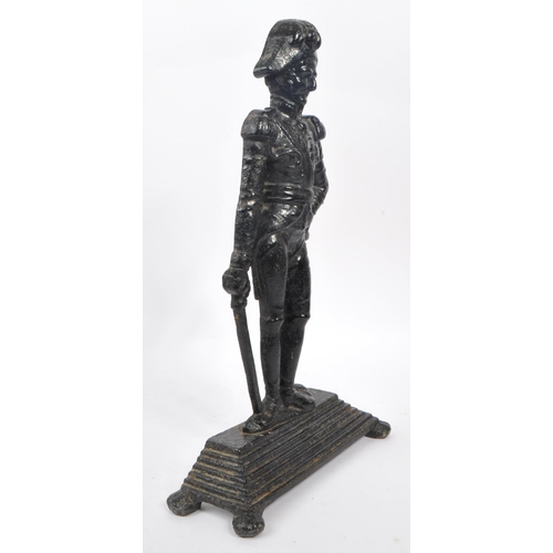 941 - An early 20th century cast iron figurative doorstop. The doorstop in the form of an 18th century Bri... 