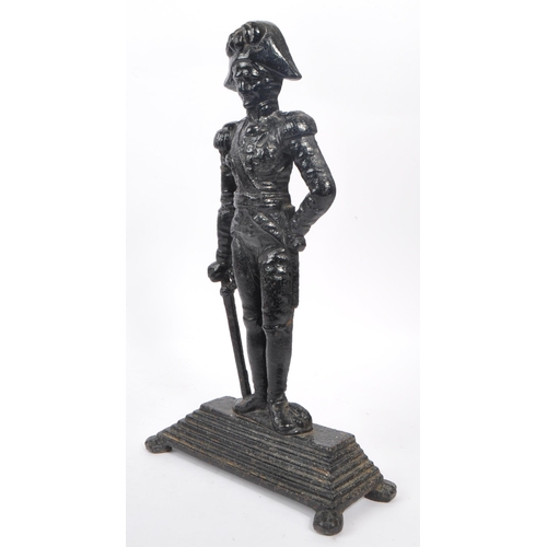 941 - An early 20th century cast iron figurative doorstop. The doorstop in the form of an 18th century Bri... 