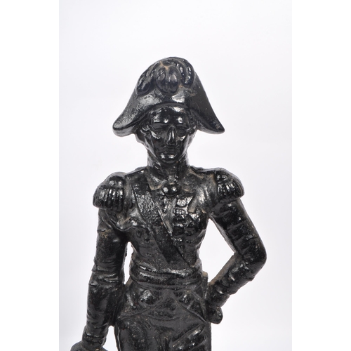 941 - An early 20th century cast iron figurative doorstop. The doorstop in the form of an 18th century Bri... 