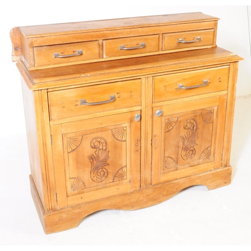 953 - An early 20th century continental ash wood sideboard. The sideboard raised on bracket feet having a ... 