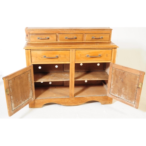 953 - An early 20th century continental ash wood sideboard. The sideboard raised on bracket feet having a ... 