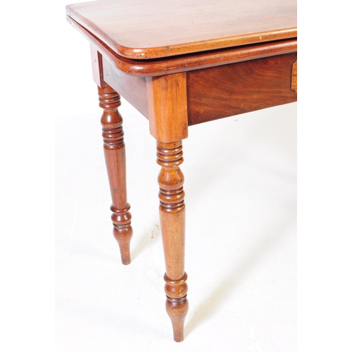 988 - A 19th century mahogany card / game table. The table having swivel action folding top with compartme... 