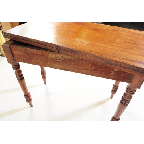 988 - A 19th century mahogany card / game table. The table having swivel action folding top with compartme... 