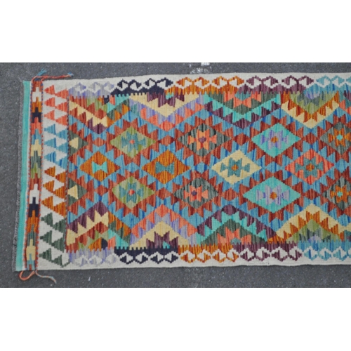 1008 - A vintage 20th century Anatolian Turkish kilim carpet floor rug. Having diamond repeating pattern to... 