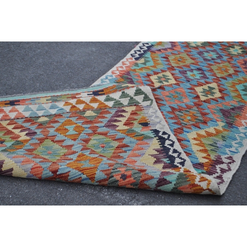 1008 - A vintage 20th century Anatolian Turkish kilim carpet floor rug. Having diamond repeating pattern to... 