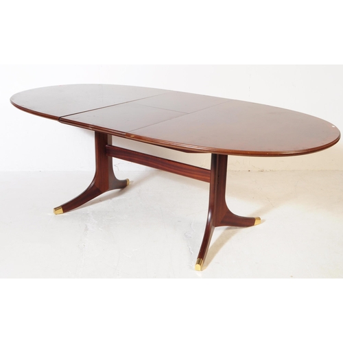 662 - G-Plan - A mid 20th century G-Plan mahogany dining table and four Fresco range dining chairs. The ta... 