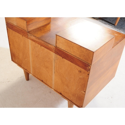 665 - Meredew Furniture - A mid 20th century Meredew Furniture teak wood chest of drawers. The chest of dr... 