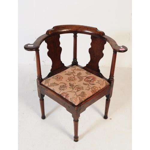 969 - A George III 19th century mahogany corner chair. Having a curved backrest with small raised centre. ... 