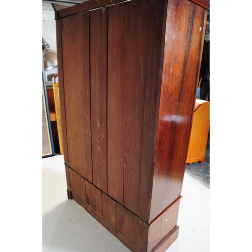 973 - An early 20th century Edwardian arts and crafts circa 1900s walnut double wardrobe closet. Having a ... 