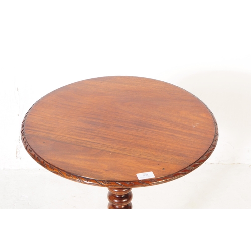 808 - A George III mahogany occasional side table. Of circular form with carved chamfered edge, bobbin tur... 