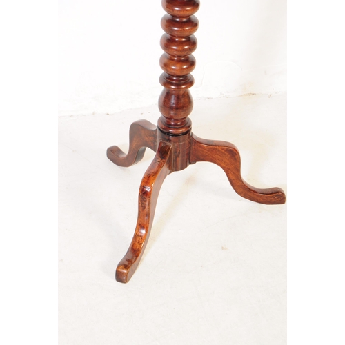 808 - A George III mahogany occasional side table. Of circular form with carved chamfered edge, bobbin tur... 