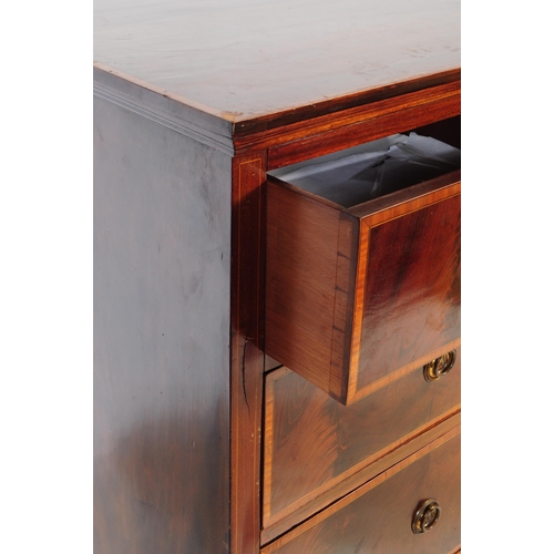 875 - An Edwardian circa 1910s mahogany flame chest of drawers. Rectangular form with chamfered edge top, ... 