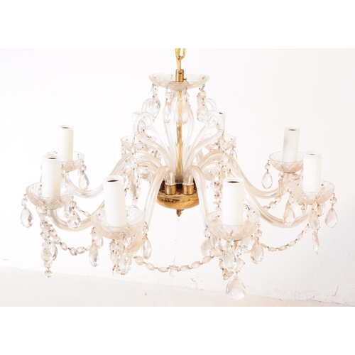 836 - A vintage 20th century venetian style eight arm glass lozenge droplet chandelier. With lozenge strin... 