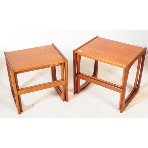 744 - G-Plan - A collection of mid 20th century G-Plan teak wood nesting tables. To include two part nests... 