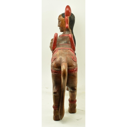 222 - An Indian Oriental 20th century hand carved painted hardwood sculpture of Kamadhenu or Surabhi. The ... 