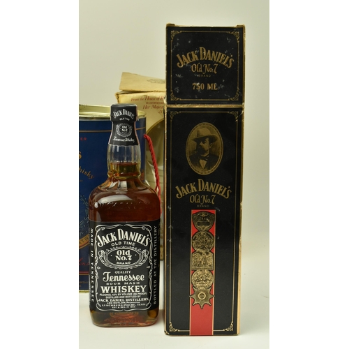 250A - A selection of mostly boxed whiskies to included Jim Beam Royal Owl ceramic decanter (still sealed),... 