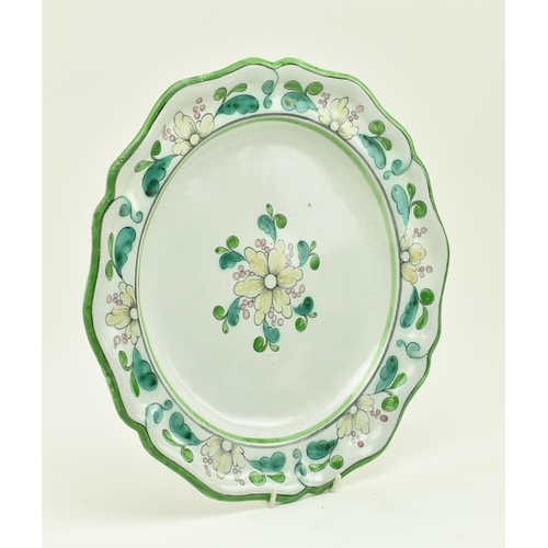 150 - A 18th century Italian continental ceramic charger. The lettuce rim charger decorated with hand pain... 