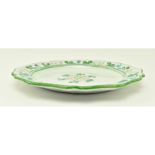 150 - A 18th century Italian continental ceramic charger. The lettuce rim charger decorated with hand pain... 