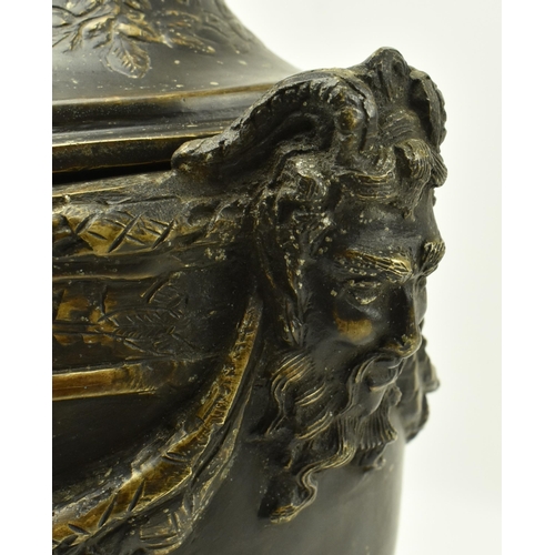 24 - A Victorian 19th century Grand Tour cast bronze lidded urn vase. The urn having a foliate shaped lid... 