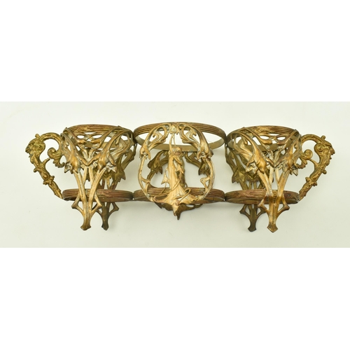 36 - A French Art Nouveau late 19th century glass & ormolu condiment set. The set comprising of two bottl... 