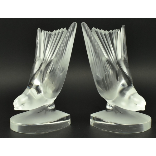 38 - Lalique, France - A pair of 20th century circa 1970s frosted & clear glass Hirondelle (swallow) book... 