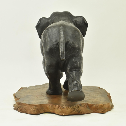 40 - A Japanese 19th century Meiji period bronze sculpture figure depicting an elephant with raised trunk... 