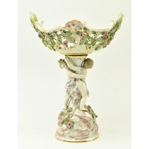 48 - Meissen, Germany - An early 20th century circa 1900 hand painted porcelain tazza with cherubs. The t... 