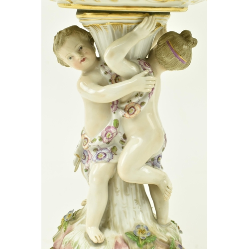 48 - Meissen, Germany - An early 20th century circa 1900 hand painted porcelain tazza with cherubs. The t... 