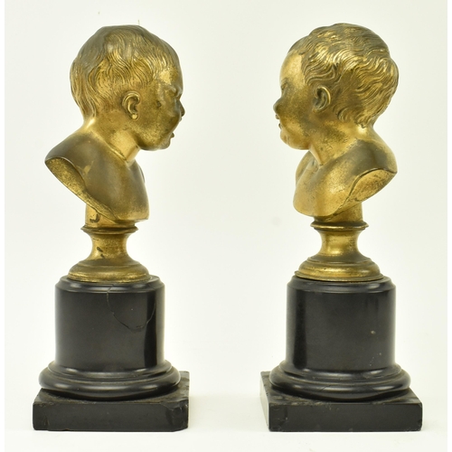 53 - A pair of Victorian 19th century patinated bronze busts of crying infants. Each depicting a crying c... 