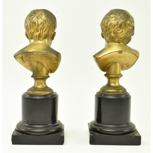 53 - A pair of Victorian 19th century patinated bronze busts of crying infants. Each depicting a crying c... 