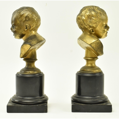 53 - A pair of Victorian 19th century patinated bronze busts of crying infants. Each depicting a crying c... 