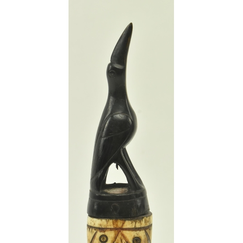 54 - A 19th century tribal possibly Native American bone and ebony medicinal powder flask. The flask feat... 