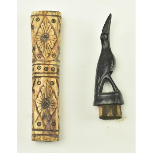 54 - A 19th century tribal possibly Native American bone and ebony medicinal powder flask. The flask feat... 