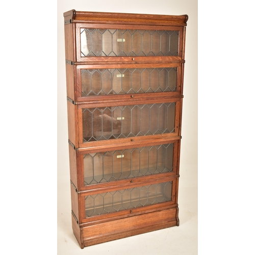 591 - Globe Wernicke - An early 20th century oak five section stacking lawyers bookcase. The bookcase havi... 