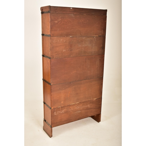 591 - Globe Wernicke - An early 20th century oak five section stacking lawyers bookcase. The bookcase havi... 