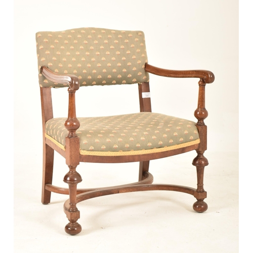 594 - A 19th century Victorian mahogany framed child's crinoline stretcher armchair. The chair having a pa... 