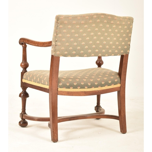 594 - A 19th century Victorian mahogany framed child's crinoline stretcher armchair. The chair having a pa... 