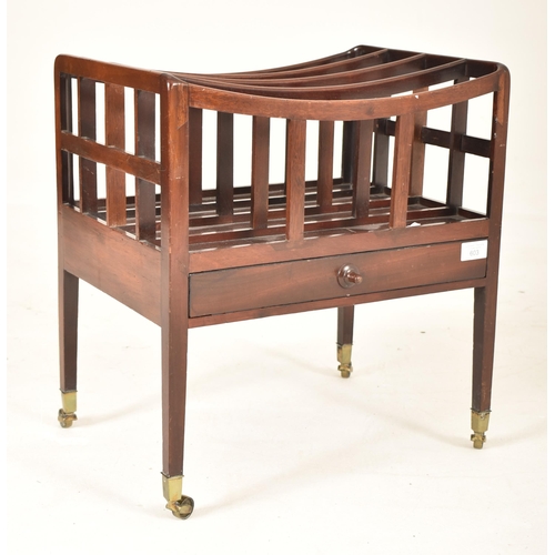 603 - A 19th century George III mahogany canterbury magazine rack stand. The Canterbury being raised on sq... 