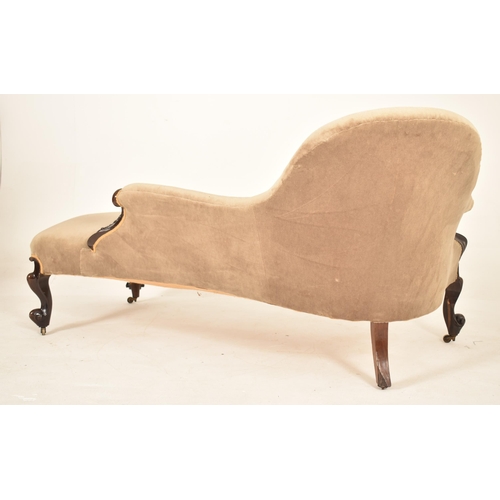 604 - A 19th century Victorian Chesterfield mahogany chaise lounge settee. The chaise lounge having a quar... 