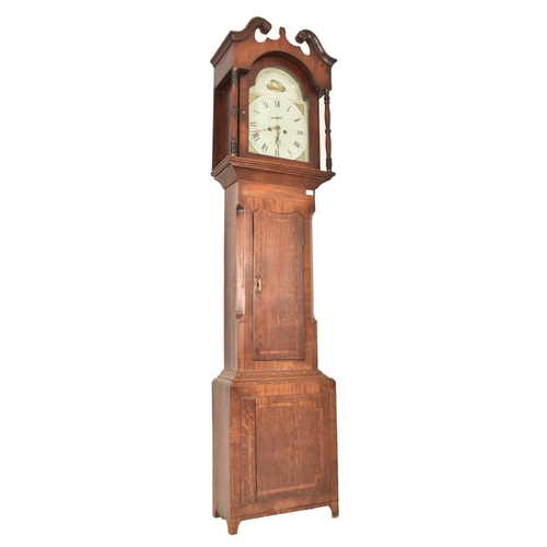 605 - A 19th century George III oak and mahogany longcase eight day grandfather clock. The clock having an... 