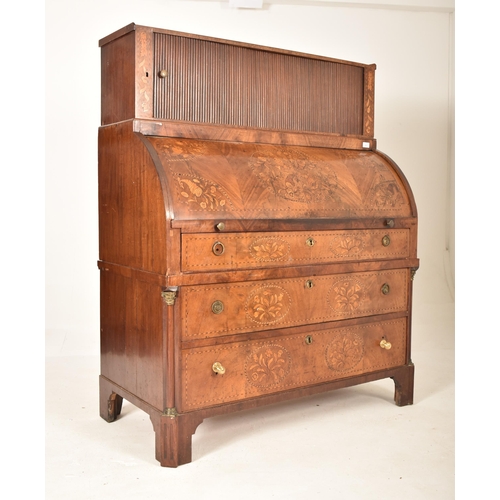 607 - A 19th century Dutch marquetery inlaid cylinder bureau desk. The bureau having tambour fronted cupbo... 