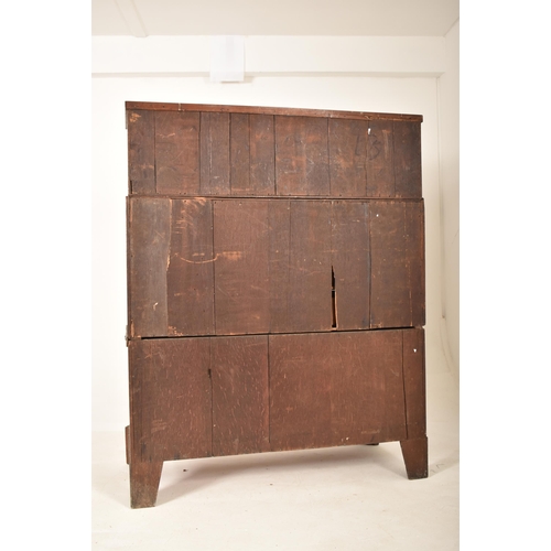 607 - A 19th century Dutch marquetery inlaid cylinder bureau desk. The bureau having tambour fronted cupbo... 