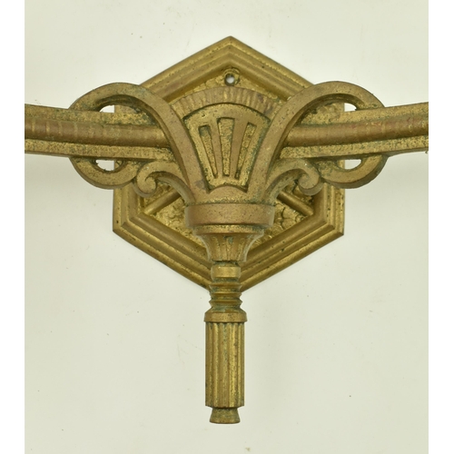 612 - Two pairs of 19th century Neoclassical gilt metal wall sconces. Each having twin arms with architect... 