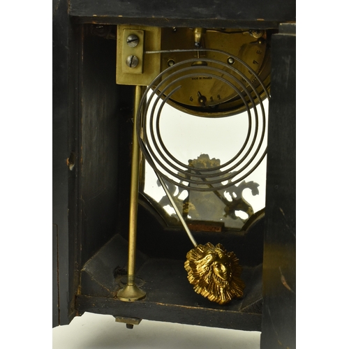 65 - A French Continental 19th century boulle work & ormolu eight-day movement mantle clock. The clock ha... 