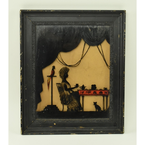 403 - A 19th century Victorian reverse glass silhouette painting. The silhouette depicting a well dressed ... 