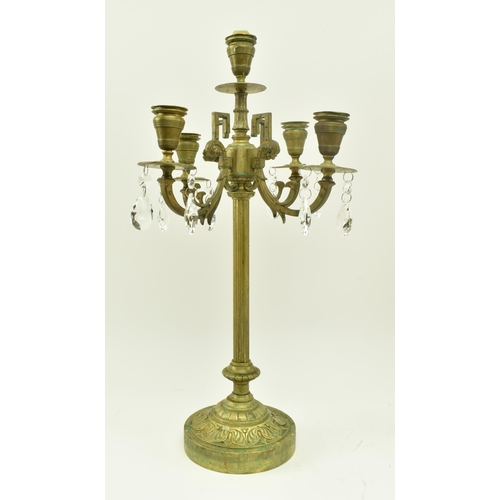 416 - A pair of French inspired early 20th century brass desk table candelabras. Each candlestick having a... 