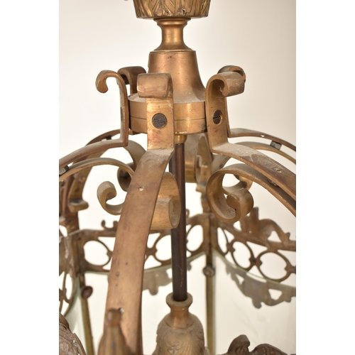 423 - A French Continental 19th century wrought / cast iron & glass farmhouse lantern ceiling light. The l... 