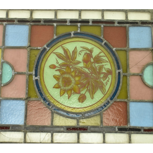 428 - A 19th century Victorian stained glass window feature panel, brightly coloured. The stained glass fr... 